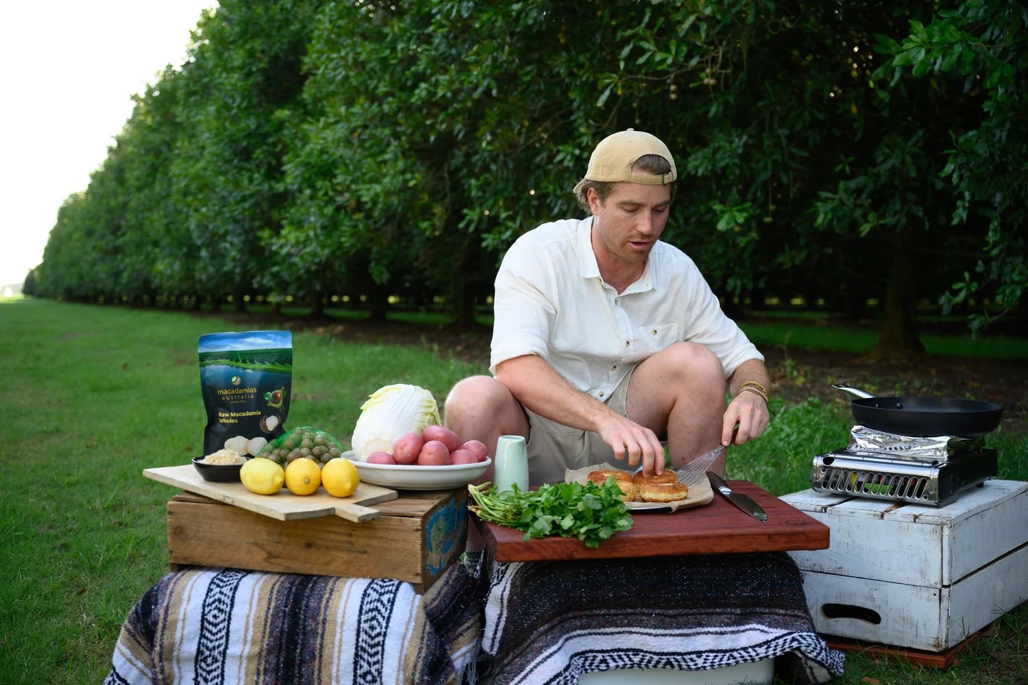 On location cooking Smoked Mackerel & Bacon Fishcakes w/ Macadamia Slaw